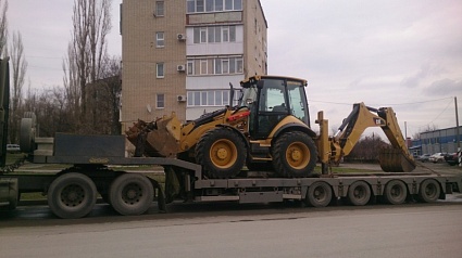 Перевозка экскаватора-погрузчика Caterpillar 434F 